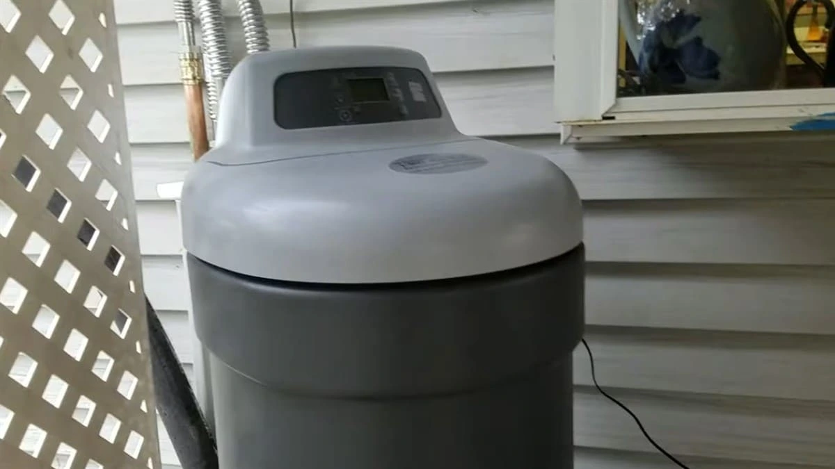 Water softener installation in Clovis CA showing whole house unit connected to main water line