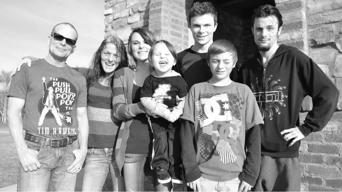 Family-owned team behind Clovis Plumbing Services standing together outdoors in Harlan Ranch, Clovis CA