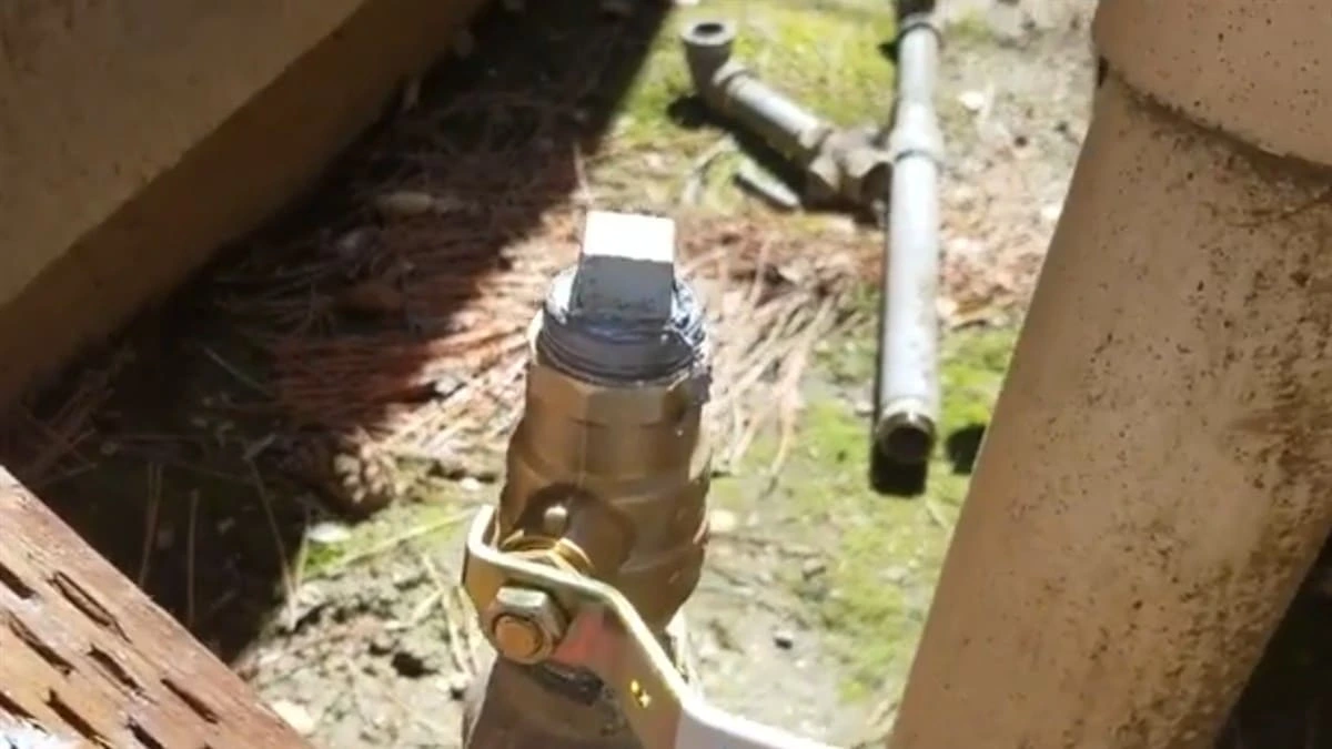 Completed gas line repair in Clovis, CA with repaired exterior gas piping and shutoff connection